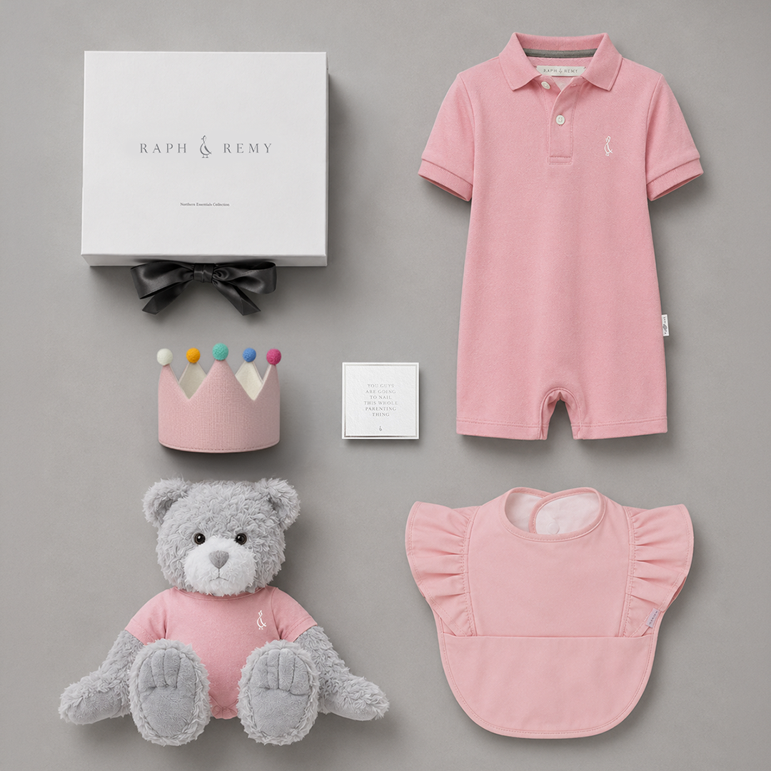 1st Birthday Box gift set in Sakura Pink: Collared Romper, Birthday Crown, Timeless Teddy and Feeding Bib, beautifully boxed