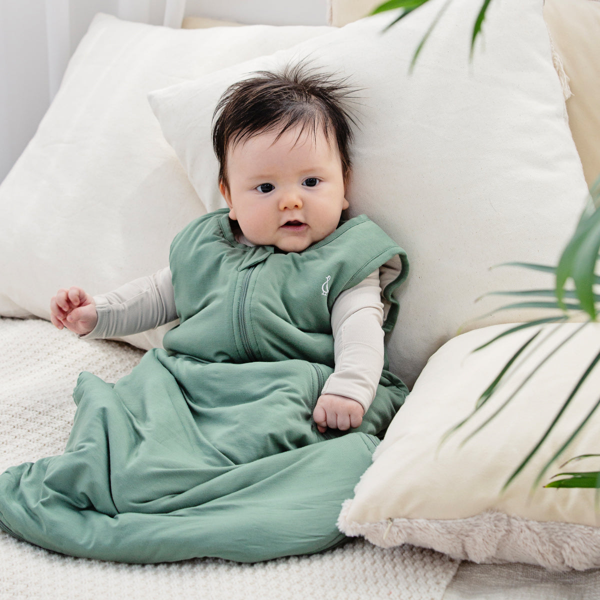 Sustainable Bamboo Long Sleeve Baby Onesie in neutral tones.