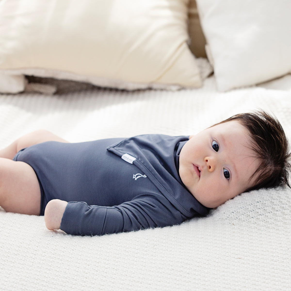 Natural Bamboo Long Sleeve Baby Onesie designed for infant comfort.