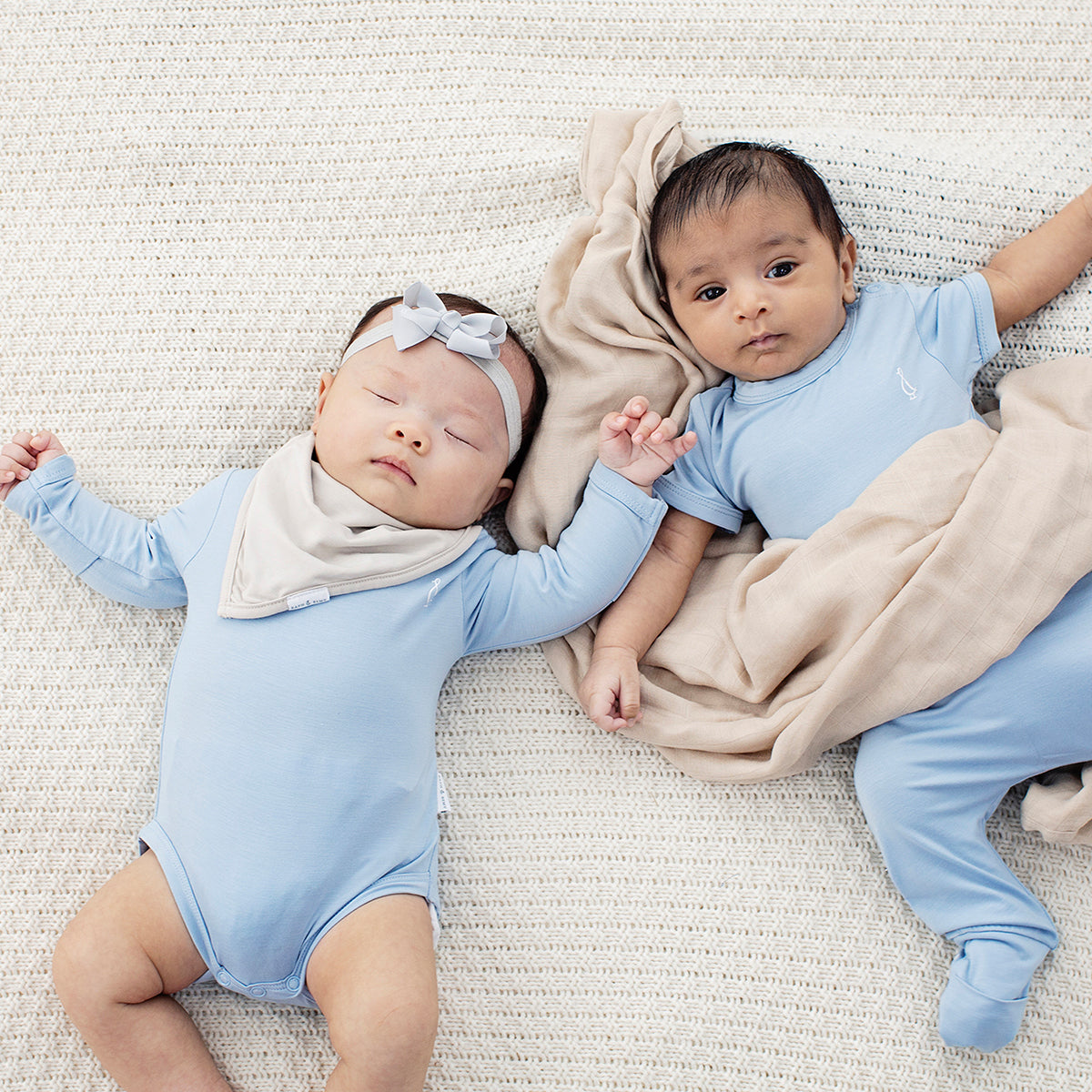 RAPH&REMY® Bamboo Long Sleeve Baby Onesie for ultimate comfort.