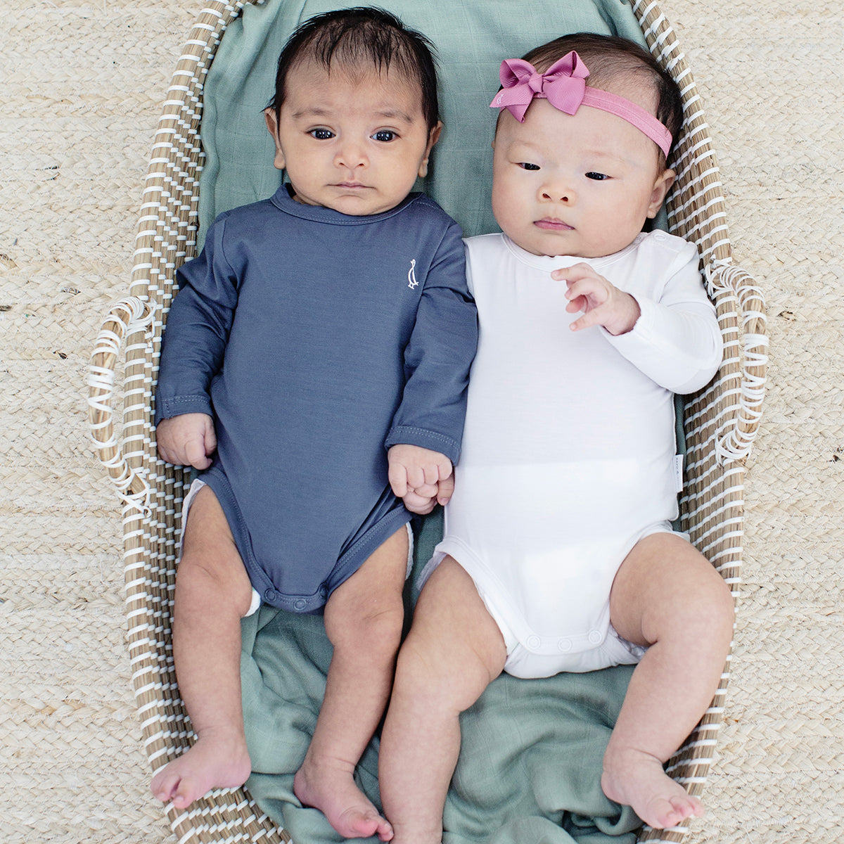 Unisex Premium Bamboo Long Sleeve Baby Onesie in natural shades.