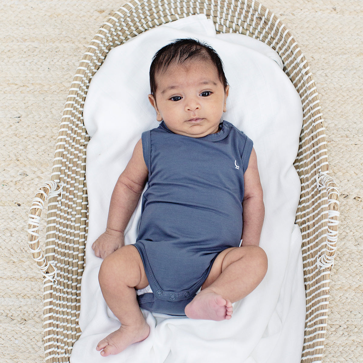Premium bamboo baby onesie, sleeveless and ultra-soft.