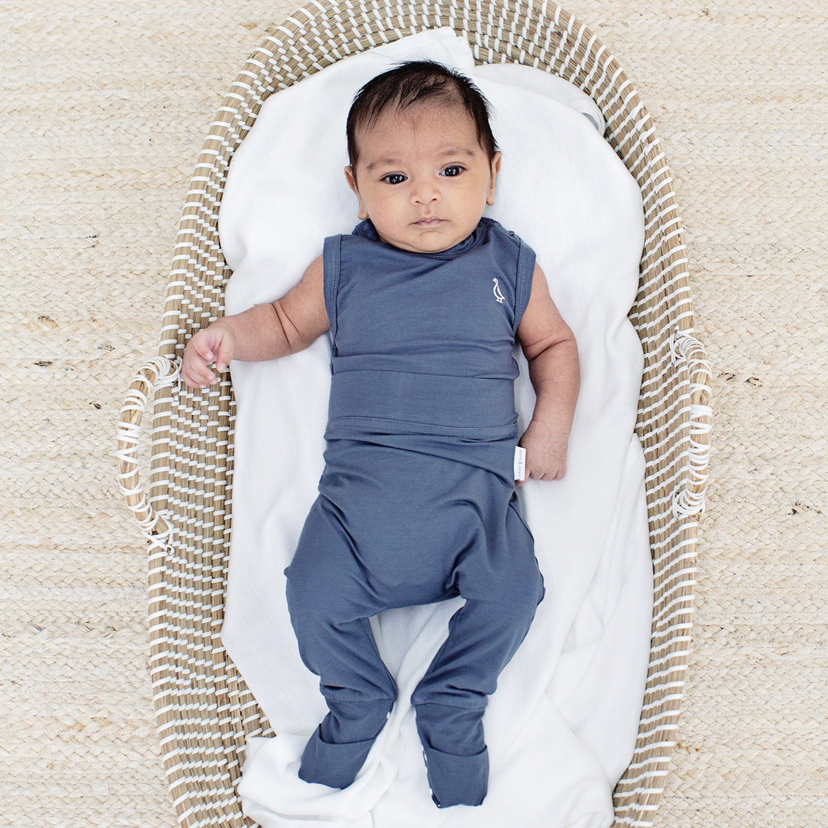 Soft bamboo sleeveless onesie for newborns by RAPH&REMY®.