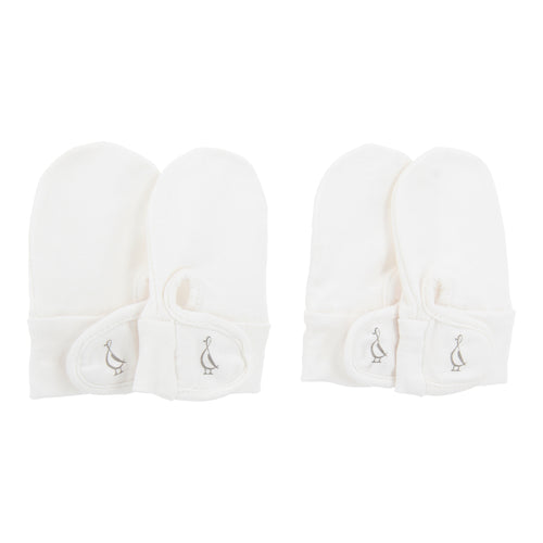 Two pairs of white bamboo baby mittens with adjustable velcro closure.