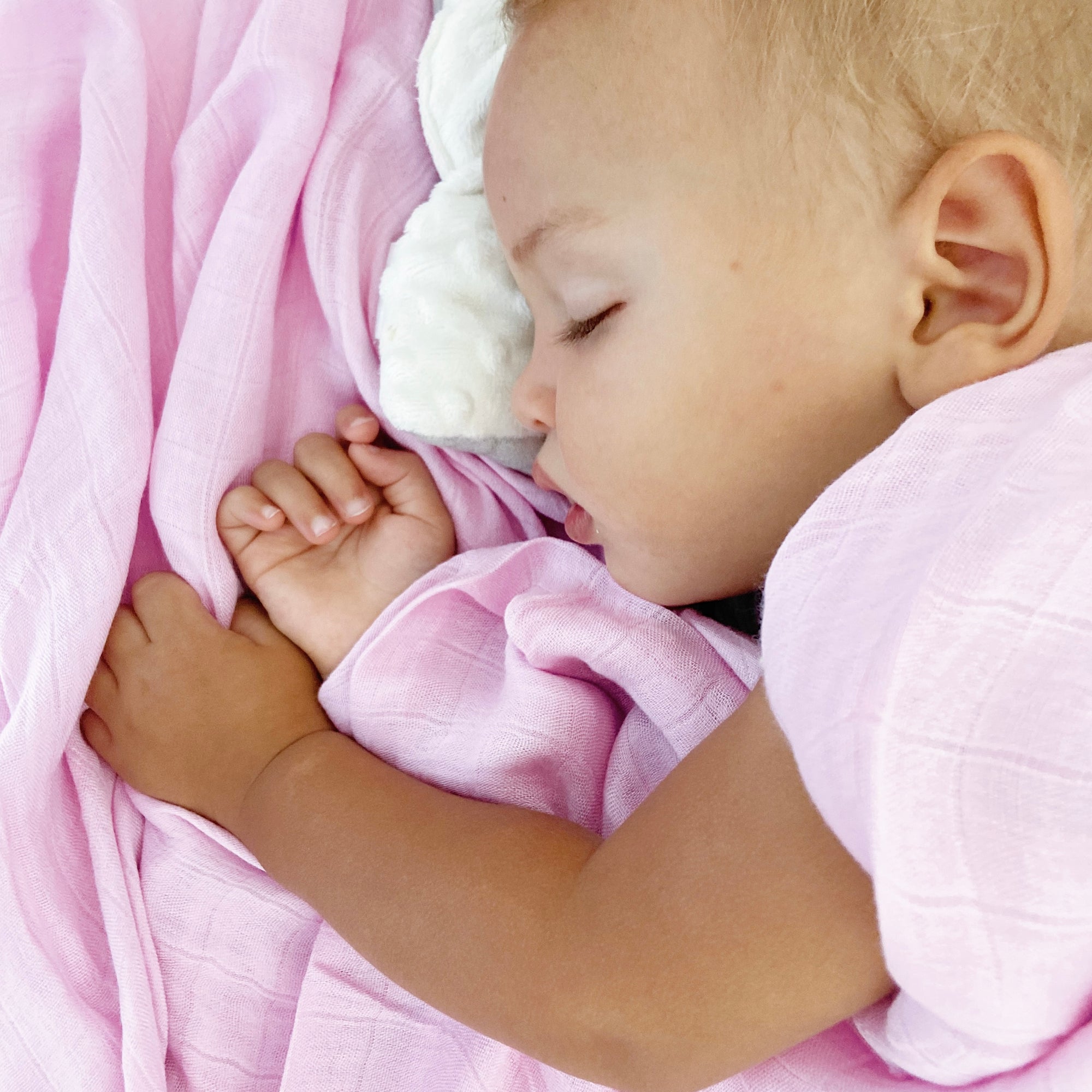 High-quality pink baby bamboo swaddle with a simple, classic design for versatile use.