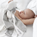 Baby cuddling SootherBuddy™ Security Blanket in soft bamboo fabric