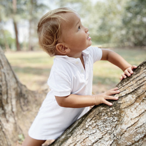 Ultra-soft and breathable bamboo romper with a classic collar in white