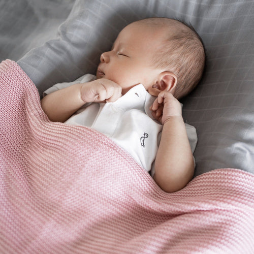 Baby sleeping wearing Bamboo Collared Romper in white